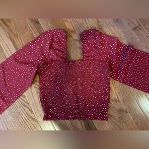 Red and white polka dot top